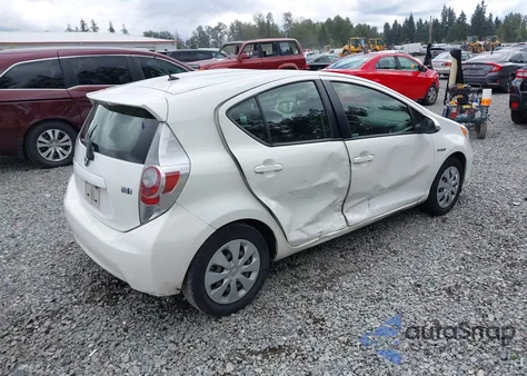 2014 Toyota Prius C Two from USA, damaged, VIN JTDKDTB32E1562635